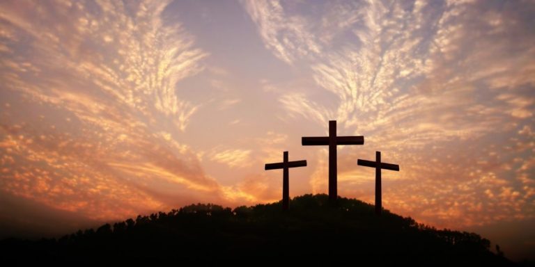 three crosses on hillside